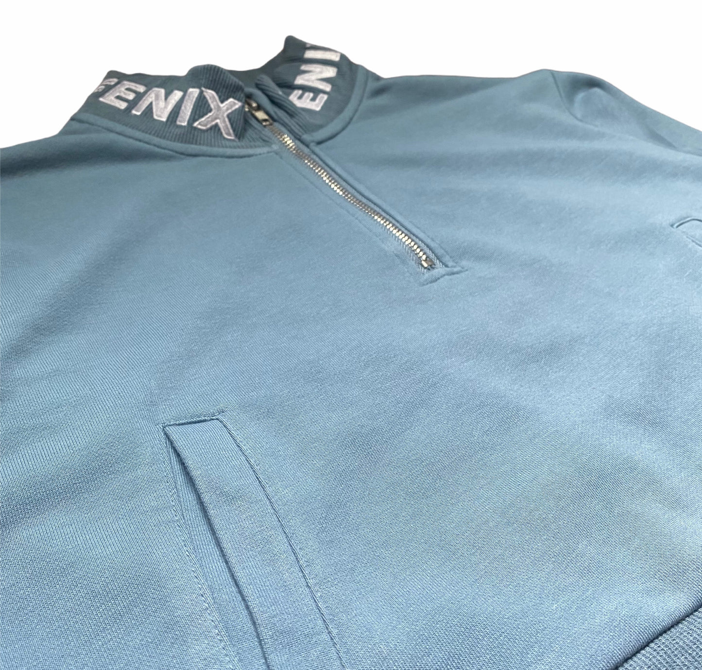 BLUE HALF ZIP-UP CROPTOP